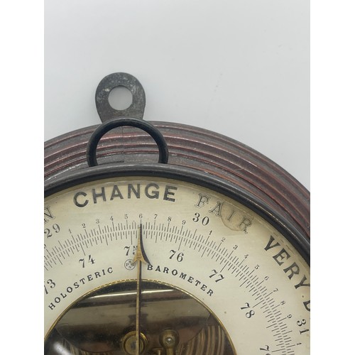 482 - C J Gaupp & Co Hong Kong wall hanging circular barometer, approximate diameter 8.5 inches