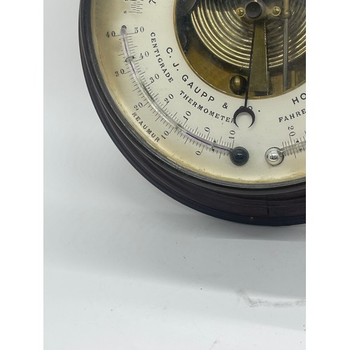 482 - C J Gaupp & Co Hong Kong wall hanging circular barometer, approximate diameter 8.5 inches