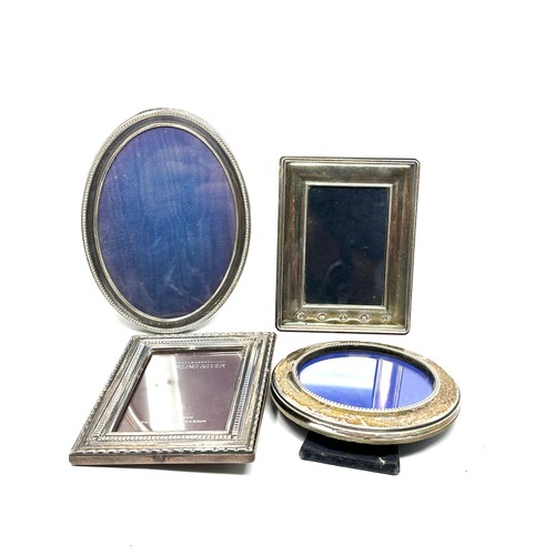 39 - 4 x .925 sterling photograph frames