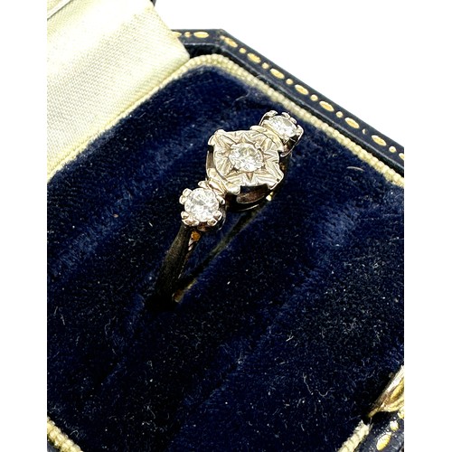 255 - 18ct gold diamond three stone ring (3.7g)