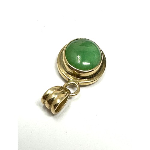 230 - 14ct gold jade pendant (1.5g)