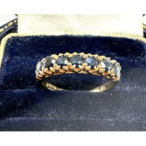 176 - 9ct gold sapphire seven stone ring (1.7g)