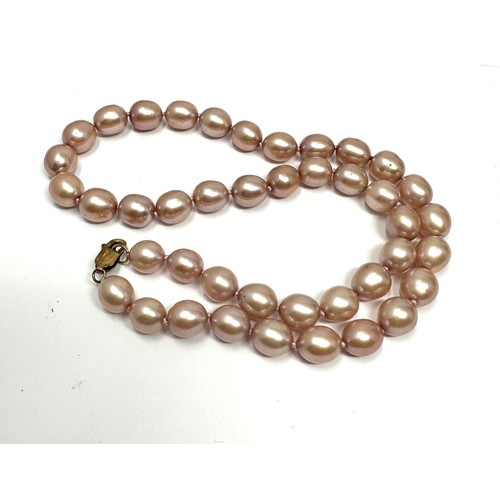 199 - 9ct gold cultured pink pearl necklace (46.4g)