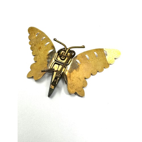 191 - 9ct gold jet butterfly brooch (1.8g)