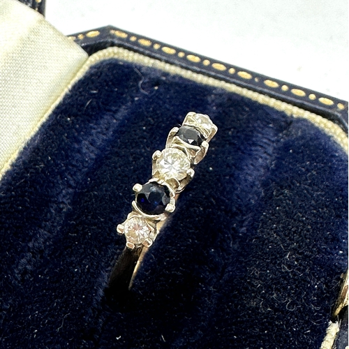 104 - 9ct gold diamond & sapphire ring weight 2g