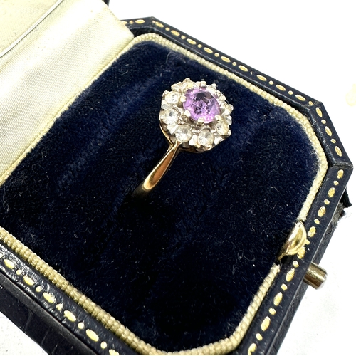 110 - 9ct gold amethyst & white gemstone ring weight 2.6g