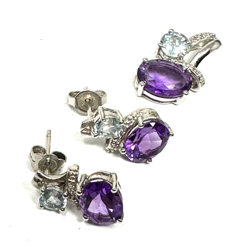 115 - 9ct white gold amethyst diamond & topaz earring & pendant set weight 4g