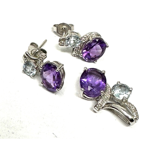 115 - 9ct white gold amethyst diamond & topaz earring & pendant set weight 4g