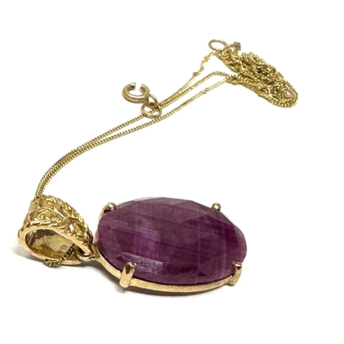 121 - 9ct gold ruby stone set pendant necklace measures approx 2.7cm drop by 1.3cm wide weight 3.6g