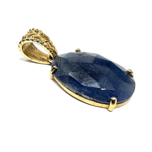 122 - 9ct gold sapphire pendant mea2.6cm drop by 1.3cm wide weight sures approx 2.8g