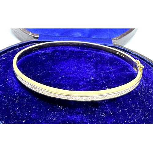 146 - 18ct gold diamond bangle set with 1ct diamonds weight approx 12g