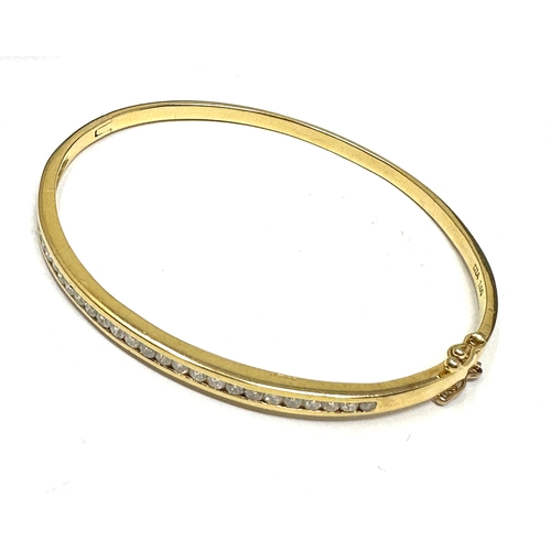 146 - 18ct gold diamond bangle set with 1ct diamonds weight approx 12g