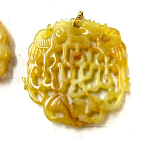 421 - 2 Carved jade chinese pendants