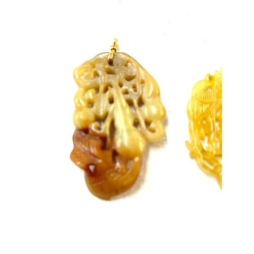 421 - 2 Carved jade chinese pendants