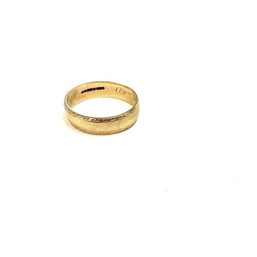 442 - 9ct gold embossed wedding band size W bweight 4.2 grams