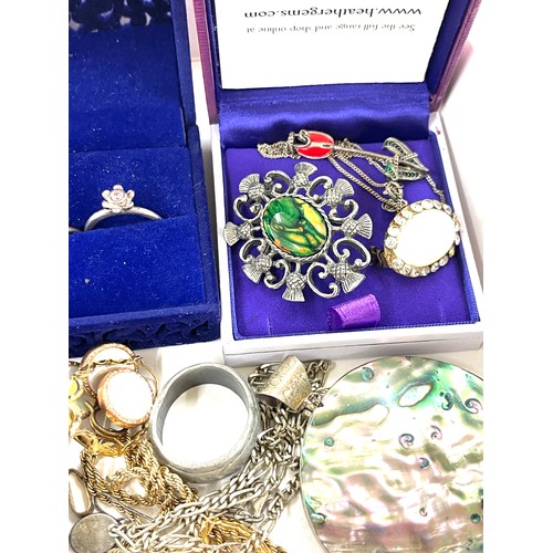 384 - Selection of vintage and later jewellery to include Silver rings, Scottish brooch etc