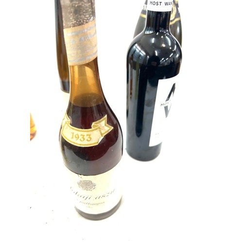 68 - Selection of sealed alcohol to include a magnum of champagne, white bottle of 1933 Toksji aszu etc