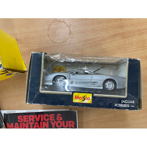 82 - Boxed Revell Porsche 959, Maisto supercar McClaren F1 road car, Jaguar XC220, together with car maga... 