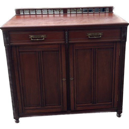 323 - Mahogany two door two drawer sideboard with gallery top measures approx 41 inches tall by 42 inches ... 