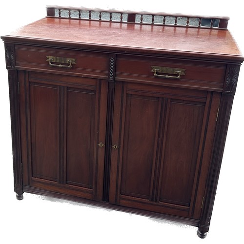 323 - Mahogany two door two drawer sideboard with gallery top measures approx 41 inches tall by 42 inches ... 