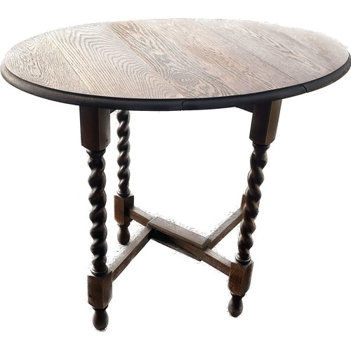 307 - Oak gate barley twist leg table measures approx 29.5 inches tall by 36 inches wide and 24 inches dee... 