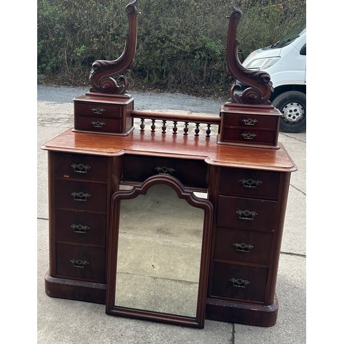 324 - 13 drawer Victorian mahogany dressing table measures approx 70 inches tall by 50 inches wide by 22 i... 