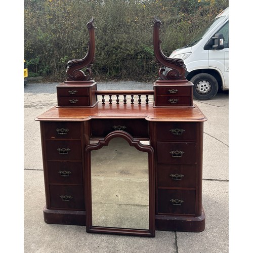 324 - 13 drawer Victorian mahogany dressing table measures approx 70 inches tall by 50 inches wide by 22 i... 