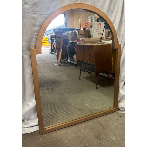 279 - Large oval topped framed mirror measures approx 52 inches tall by 38.5 inches wide