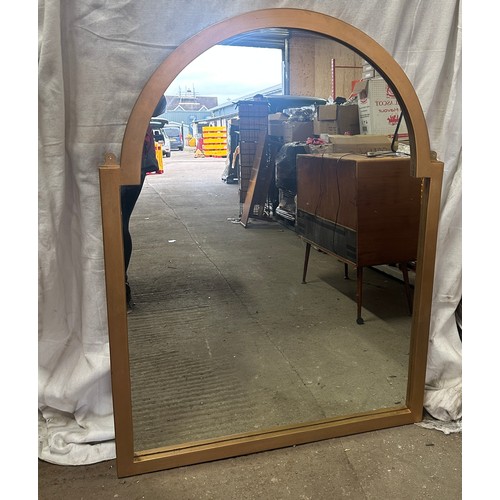 279 - Large oval topped framed mirror measures approx 52 inches tall by 38.5 inches wide