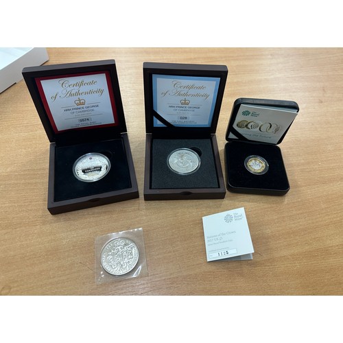 466 - Selection of silver commemorative coins includes HRH prince george, pound coin etc