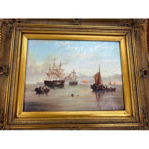 44 - Gilt framed oil on boards depicting gallions measures approximately 24 inches wide 19 inches long