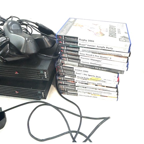 166 - 2 x  Play station 2s and a playstation 1 console, 5 controllers and a selection of assorted games, u... 