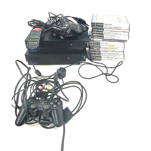 166 - 2 x  Play station 2s and a playstation 1 console, 5 controllers and a selection of assorted games, u... 