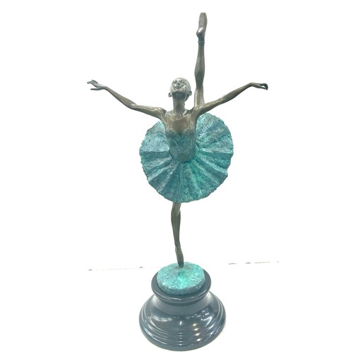 A large bronze sculpture of a ballerina with verdigris colouring, signed Milo, marble base, overall height 26 inches