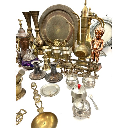 194 - Selection of metal ware to include vases, Dallah, jugs, ornaments etc