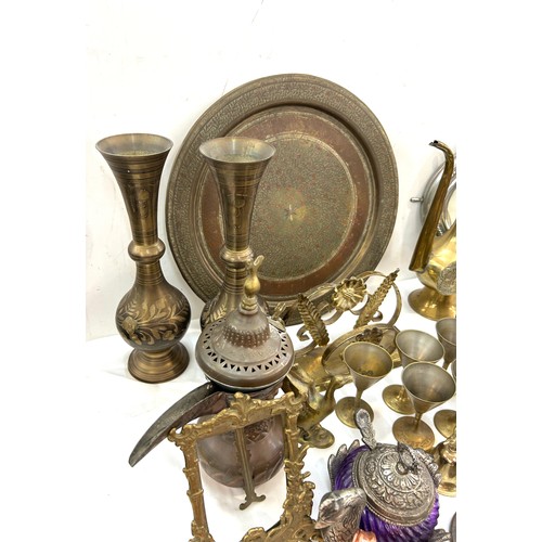 194 - Selection of metal ware to include vases, Dallah, jugs, ornaments etc