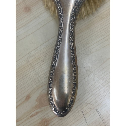 394 - Hallmarked Chester silver vanity brush