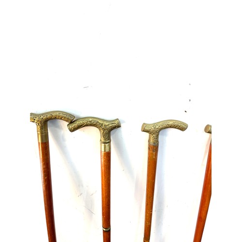 106 - Selection of vintage wooden walking sticks with brass handles (6 in total)