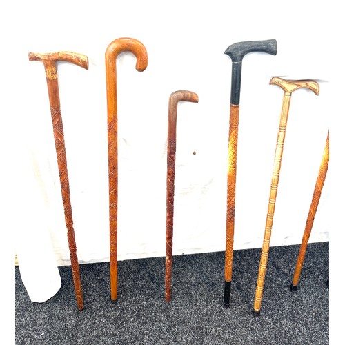 141 - Selection of vintage carved walking sticks  (8 sticks in total)