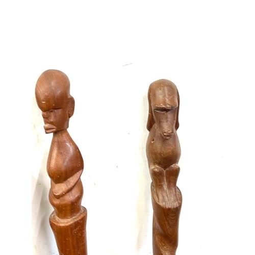 121 - Selection of 3 carved African tribal walking sticks