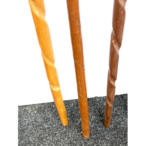 121 - Selection of 3 carved African tribal walking sticks