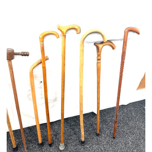 128 - Selection of vintage walking sticks, various handle designs, some carved  (9 sticks in total)