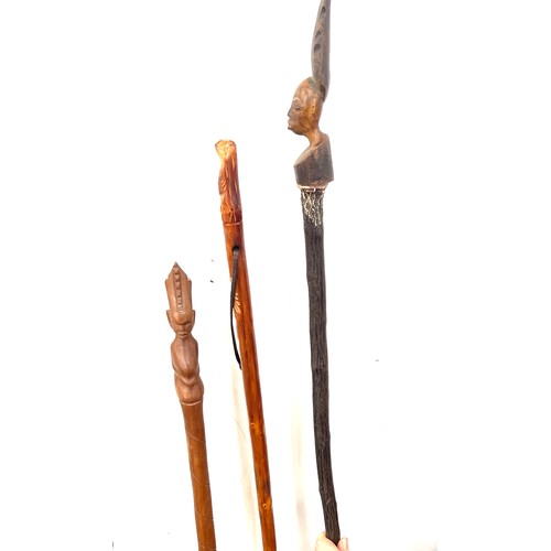 117 - Selection of 3 carved African tribal walking sticks