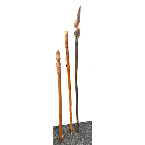 117 - Selection of 3 carved African tribal walking sticks