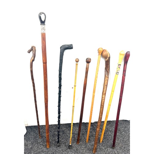 147 - Selection of vintage walking sticks, various handle designs  (9 sticks in total)