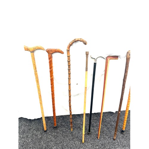 130 - Selection of vintage walking sticks, various handle designs  (8 sticks in total)