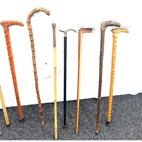 130 - Selection of vintage walking sticks, various handle designs  (8 sticks in total)