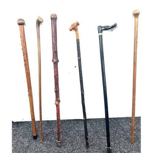 129 - Selection of vintage walking sticks, various handle designs  (7 sticks in total)