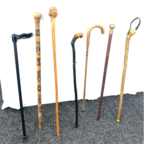 133 - Selection of vintage walking sticks, various handle designs  (8 sticks in total)