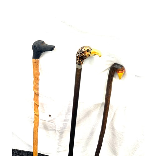 146 - Selection of 3 vintage wooden walking sticks, with animal feature handles, duck, dog, eagle